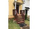 Charming house with a small porch and steps leading to the entrance at 800 Crestside Ct # 800, Austell, GA 30168