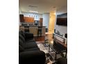 Open living space with modern furniture and kitchen at 870 Mayson Turner Nw Rd # 1110, Atlanta, GA 30314