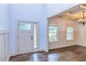 Bright entryway with hardwood floors and wainscoting at 45 Knight Ln, Mcdonough, GA 30252