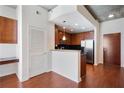 Modern kitchen with wood cabinets and granite countertops at 3324 Peachtree Ne Rd # 1510, Atlanta, GA 30326