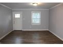 Spacious living room featuring hardwood floors and neutral walls at 1026 Valley View Rd, Atlanta, GA 30315