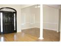 Hardwood and tile entryway floors, featuring an arched door at 321 Whitney Ln, Mcdonough, GA 30253