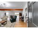 Bright entryway with hardwood floors, leading to living room and dining area at 1083 Amelia Sw Dr, Marietta, GA 30060