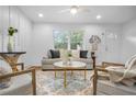 Bright and airy living room with a cozy sitting area at 2522 Candler Woods Dr, Decatur, GA 30032