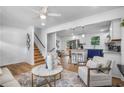 Open concept living room and kitchen with hardwood floors at 2522 Candler Woods Dr, Decatur, GA 30032