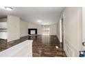 Spacious living room featuring hardwood floors and fireplace at 201 Cloud Dr, Locust Grove, GA 30248