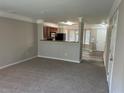Spacious living room with carpeting, neutral walls, and an open floor plan at 837 Crestwell Sw Cir, Atlanta, GA 30331