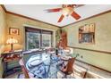 Bright dining room with glass table and four chairs at 68 Montre Nw Sq, Atlanta, GA 30327