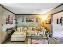 Spacious living room featuring a comfortable sectional sofa and large windows at 68 Montre Nw Sq, Atlanta, GA 30327