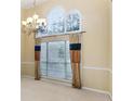 Bright dining room featuring large windows with decorative curtains and a chandelier at 129 Talon Pl, Mcdonough, GA 30253