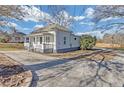 Newly renovated cottage with a spacious driveway and side yard at 1794 Spring Ne St, Conyers, GA 30012