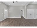 Spacious living room with hardwood floors, neutral walls and plenty of natural light at 1794 Spring Ne St, Conyers, GA 30012