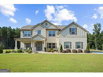 Two story house with brick and siding at 125 Leverett Ct, Fayetteville, GA 30215