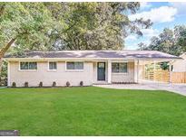Ranch-style home with updated exterior and landscaping at 3188 Convair Ln, Decatur, GA 30032