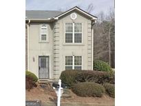 Two story townhome with neutral color exterior at 4403 Pinscher St, Union City, GA 30291