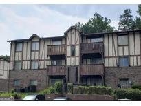 Exterior view of a two story apartment building at 1505 Camelot Dr, College Park, GA 30349