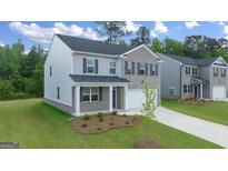 Two-story brick home with attached garage at 544 Whitman (Lot 12) Ln # 2012, Stockbridge, GA 30281