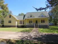Ranch style home with front porch at 402 Thurman Rd, Stockbridge, GA 30281