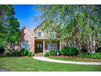 Brick house with a large front yard and porch at 197 Westbrook Rd, Carrollton, GA 30116