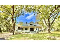 Charming two-story house with a large front porch at 1471 Centennial Rd, Rutledge, GA 30663