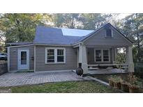 Charming one-story home with covered porch at 6851 Queen Mill Se Rd, Mableton, GA 30126