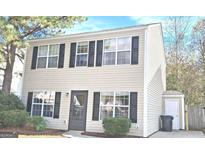 Two-story house with beige siding, black shutters at 1986 Patterson Park Pl, Lawrenceville, GA 30044