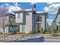 Modern two-story home with gray siding and landscaped front yard at 265 High St, Fayetteville, GA 30214