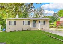 Updated ranch home with fresh paint and landscaping at 3800 Clovis Nw Ct, Atlanta, GA 30331