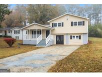 Two-story house with a spacious yard and attached garage at 987 Overbrook Cir, Marietta, GA 30062