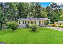 Charming ranch home with a well-manicured lawn at 757 Alfred Nw Rd, Atlanta, GA 30331