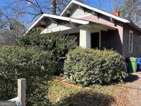 Charming bungalow with front porch and mature landscaping at 1839 Lakewood Se Ave, Atlanta, GA 30315