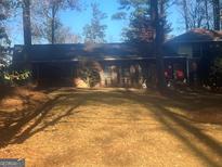 Ranch style home with attached garage and spacious yard at 2819 Lakeshore Dr, College Park, GA 30337