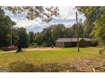 Ranch style home with a large yard at 6640 E Stubbs, Atlanta, GA 30349