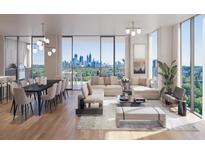 Spacious living room with city views and modern furniture at 2425 Peachtree Ne Rd # 1806, Atlanta, GA 30305