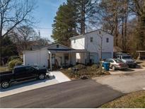 House with detached garage and ample parking at 541 Mary Lou St, Suwanee, GA 30024
