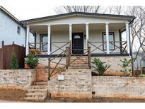 Charming craftsman style home with a welcoming front porch at 154 Graves Nw St, Atlanta, GA 30314