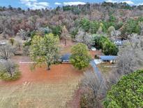 Aerial view of house and expansive lot at 991 Grassdale Nw Rd, Cartersville, GA 30121