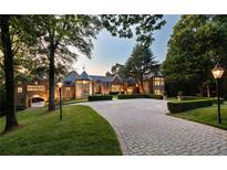 Elegant home with stone facade at 4665 Riverview Rd, Atlanta, GA 30327