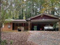 Brick ranch house with carport and mature trees at 2364 El Paso Sw Rd, Atlanta, GA 30331