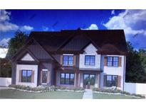 Two-story craftsman style home with gray and white exterior, and landscaping at 3640 Sky Ln, Cumming, GA 30041
