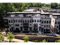 Aerial view of modern townhomes with white brick exteriors at 517 Whitlox Nw Rd, Atlanta, GA 30318