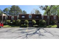 Front view of a multi-unit building with ample parking at 2936 Parc Lorraine # 2936, Lithonia, GA 30038