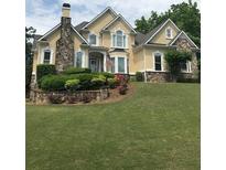 Two-story house with stone accents and large yard at 761 Hardage Farm Nw Dr, Marietta, GA 30064