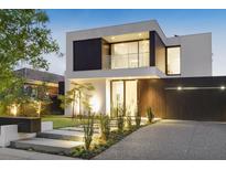 Stunning contemporary home with a sleek design and modern landscaping at 4821 Neal Rdg, Atlanta, GA 30349