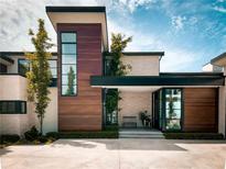 Modern home with wood and stone exterior at 4837 Neal Rdg, Atlanta, GA 30349