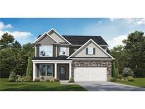 Two-story home with stone and siding exterior at 6103 Ruby Falls, Stonecrest, GA 30038