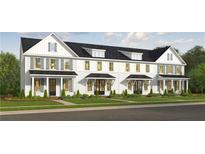 Three-unit townhome building with farmhouse style and landscaping at 1725 Prospect Way, Conyers, GA 30094