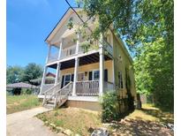 Two-story house with front porch and balcony at 2159 Martin Luther King, Jr. Dr, Atlanta, GA 30310
