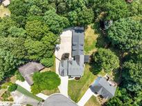 Aerial view of house and surrounding area, showcasing a large backyard and neighborhood context at 3965 Hamilton View Way, Dacula, GA 30019