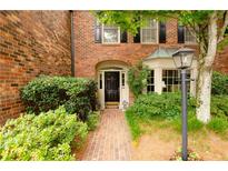 Brick townhouse with a charming front entryway at 3081 Howell Mill Nw Rd # 3, Atlanta, GA 30327